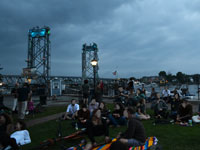 View of Memorial Bridge and Prescott Park during Prescott Park Concert Series, downtown Portsmouth, N.H.